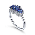 Gabriel & Co. LR52023W45SA 14K White Gold Diamond and Sapphire Oval Halo Three Stone Ring